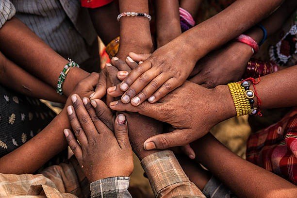 hands in unity India