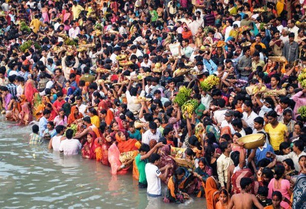 full river bank of devotees
